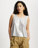 Model wears sleeveless Scoop shell top in sunbeam silver