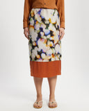 Model wears Contrast Slip Midi Skirt with watercolour and contrast silk orange