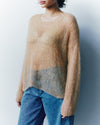 model wearing a light brown knitted jumper