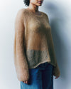 model wearing a light brown knitted jumper