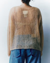 model wearing a light brown knitted jumper