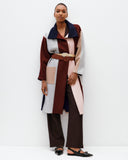Model wears Spliced Felt Coat in contrast colours