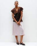 Model wears Pearl Bias Cut Skirt