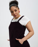 Model wears Aubergine Corduroy Pinafore 