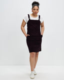 Model wears Aubergine Corduroy Pinafore 