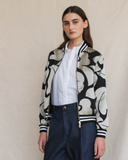 Model wearing silver and black aviator