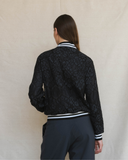 Model wears Aviator Jacket - Dark Navy Lace