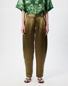 Model wearing chartreuse coloured satin barrel leg pants 