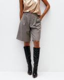 Model wears Bermuda Checked Shorts