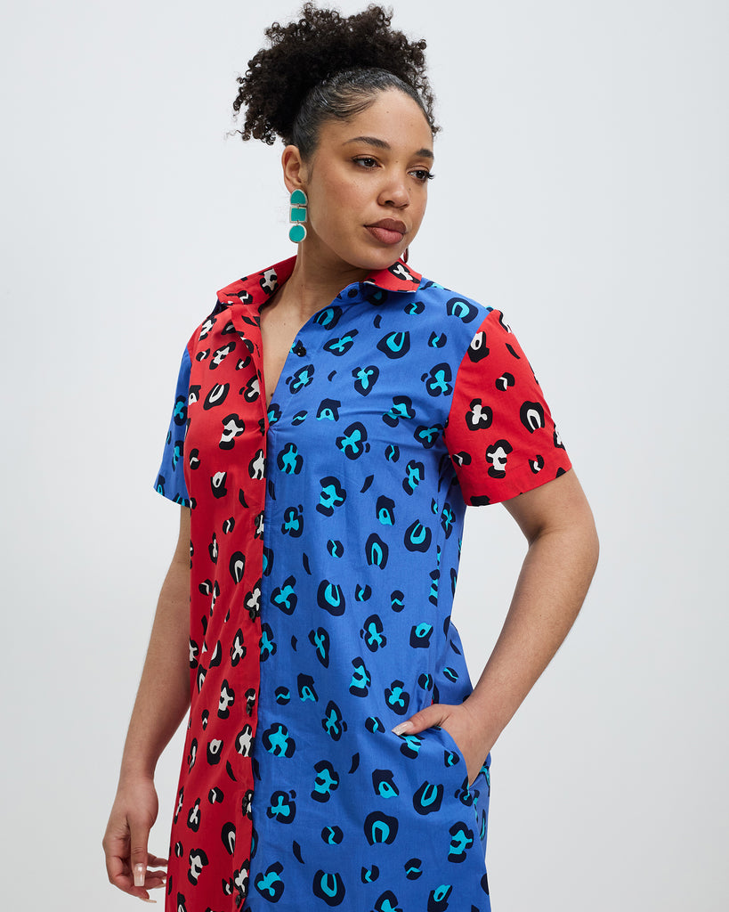 Model wears red and blue spliced Cheetah shirt dress