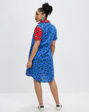Model wears red and blue spliced Cheetah shirt dress