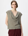 model wearing our cowl draped top in neutral check with burgundy pants