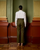Model wears Dark Olive Pinstripe Pant