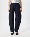 model wearing denim barrel leg pants 