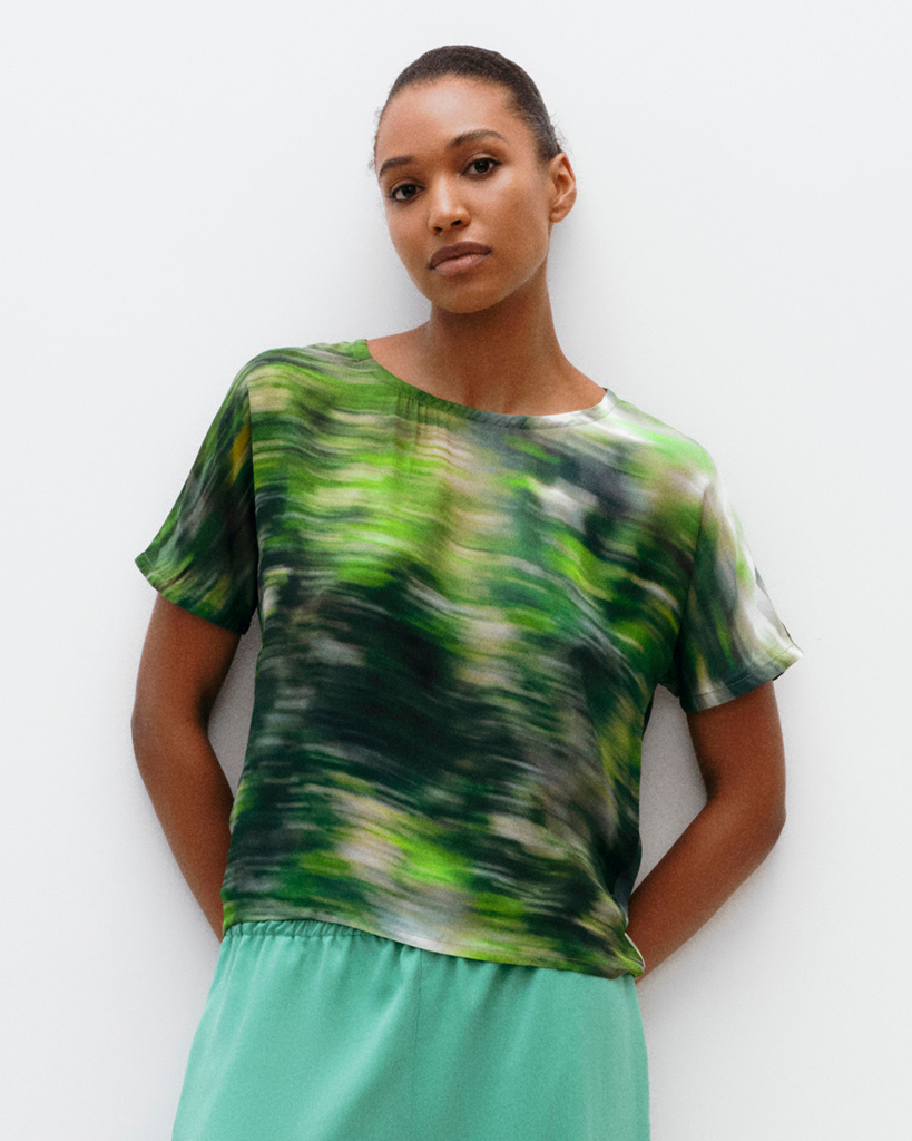 Model wears Dolman top in Sea Kelp