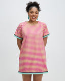 Model wears Elafonisi Sports Raglan Mini Dress