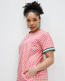 Model wears Elafonisi Sports Raglan Mini Dress