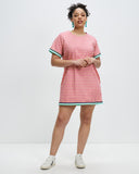 Model wears Elafonisi Sports Raglan Mini Dress