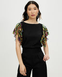 Model wears Ember Spark Sequin Sleeve Top