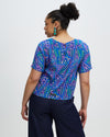 Model wears Fariba Silk Tee