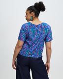 Model wears Fariba Silk Tee