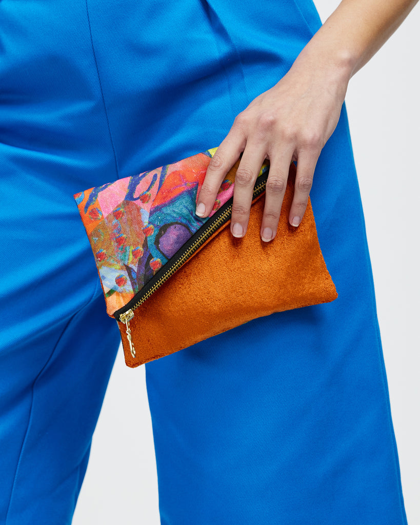 Model holds Foldover Purse - Amplify Velvet