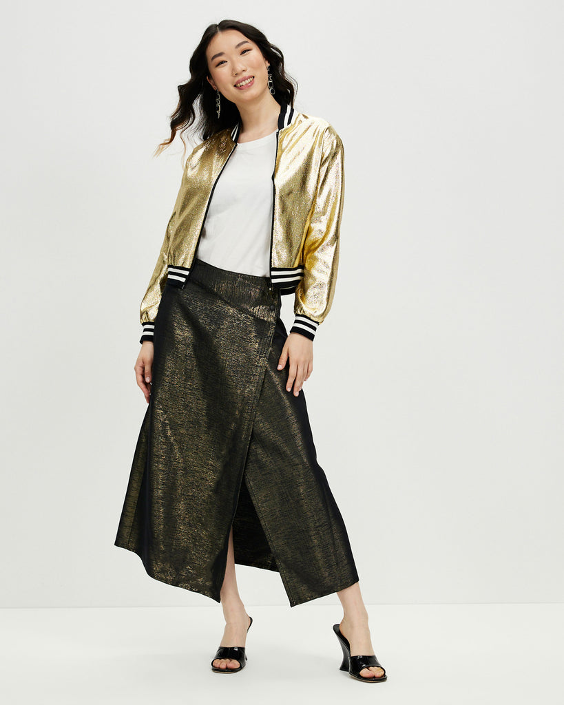 Model wears Golden Hour Asymmetric Wrap Skirt