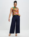 Model wears Community Print Granville Heroes silk Shell Top