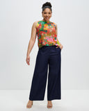 Model wears Community Print Granville Heroes silk Shell Top