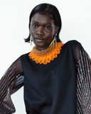 Model wears Honey Gold Billiano Large Beaded Necklace