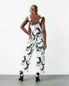 Model wears Li-Phay-Overalls