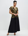 Model wears Liquid Gold Karen Top