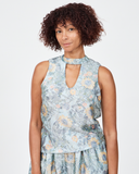 Model wears Litha Aqua tie neck top