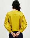 Model wears Marigold Bishop Sleeve Top