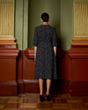 Model wears Navy Spot Wrap Dress