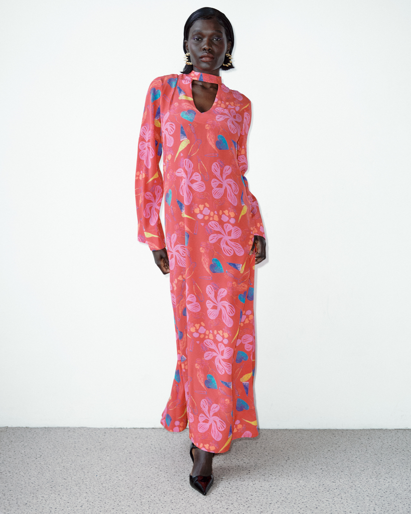 Model wears Ken Done Parrots Silk Maxi Anthology Dress