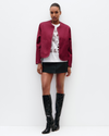Model wears Quilted Liner Silk Jacket in Cherry Red