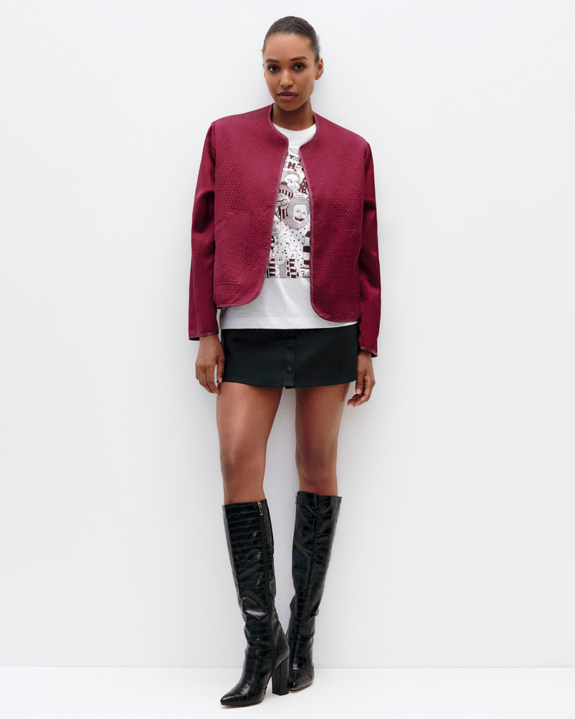 Model wears Quilted Liner Silk Jacket in Cherry Red