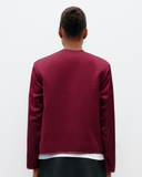 Model wears Quilted Liner Silk Jacket in Cherry Red