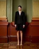 Model wears Raven Black Fitted Blazer