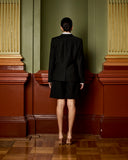 Model wears Raven Black Fitted Blazer