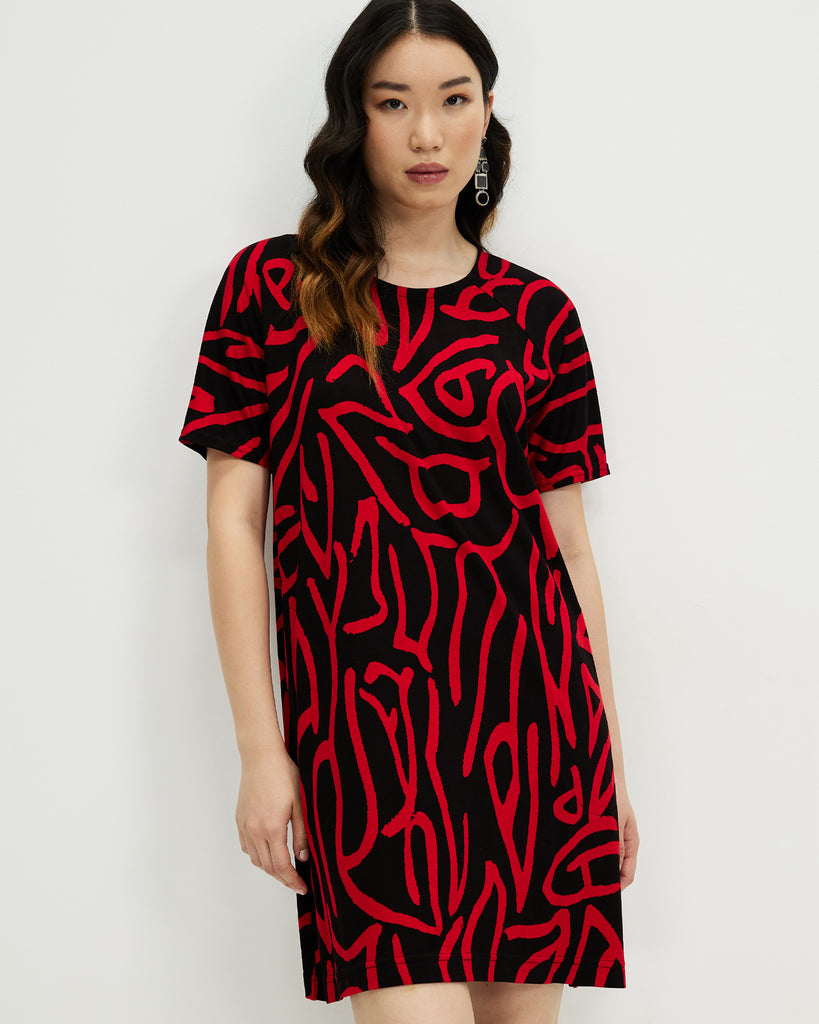 Model wears Red Nimbus Tee Dress