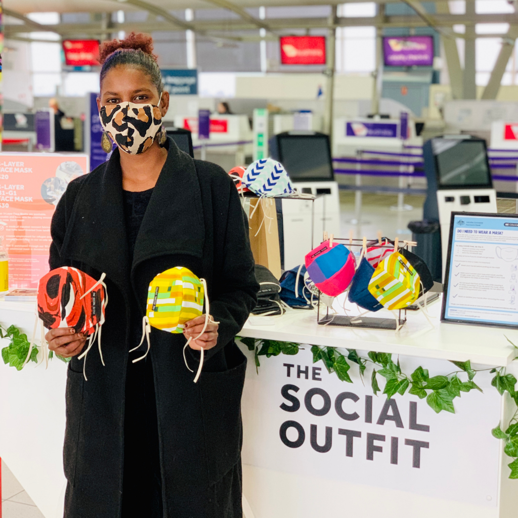 Retail Assistant Hani Selling The Social Outfit Facemasks at Sydney Airport