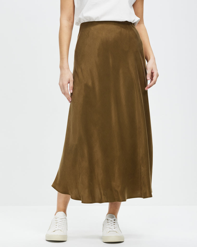 Model wears Revel Bias Cut Skirt - Bronze