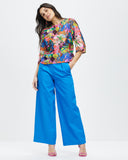 Model wears Silk Smock Top - Amplify