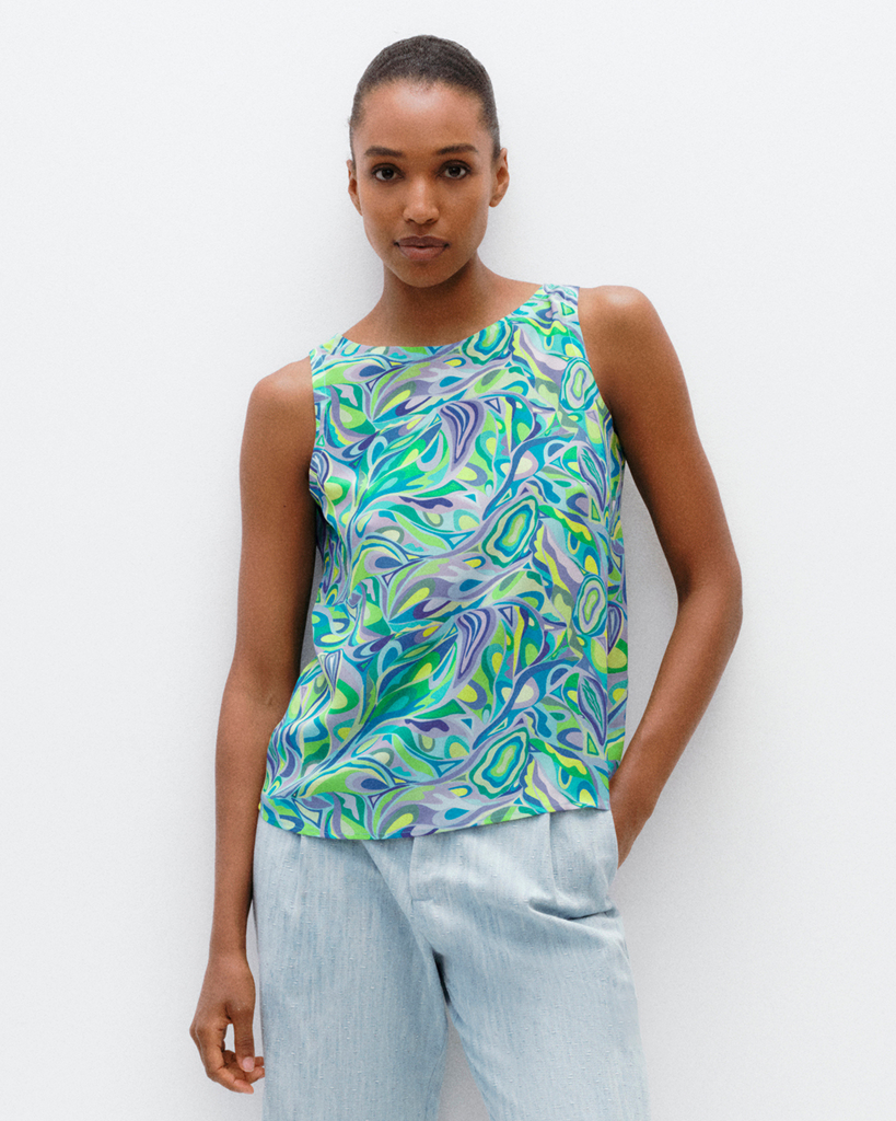 Model wears Shell Top in Reflections