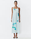 Model wears Strappy Column Dress in white based Sama pinstripe Print 