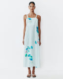 Model wears Strappy Column Dress in white based Sama pinstripe Print 