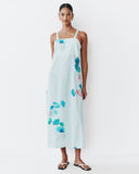 Model wears Strappy Column Dress in white based Sama pinstripe Print 