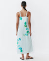Model wears Strappy Column Dress in white based Sama pinstripe Print 